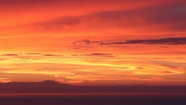 Varför blir himlen rosa vid solnedgång